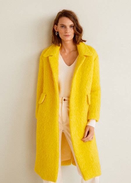 Abrigo mujer amarillo Continuara.org