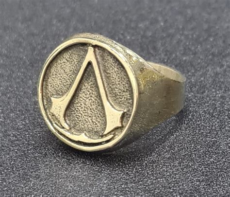 Anillo assassins creed Continuara.org