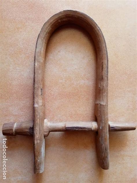 Antiguo collar madera Continuara.org
