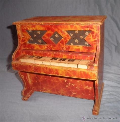 Antiguo piano juguete Continuara.org