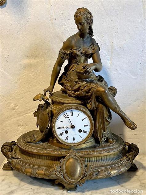 Antiguo reloj bronce Continuara.org