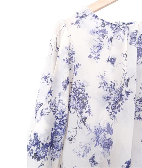 Blusa blanca azul Continuara.org