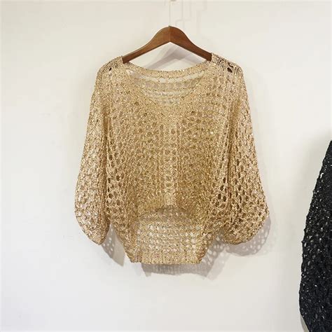 Blusa dorada una Continuara.org