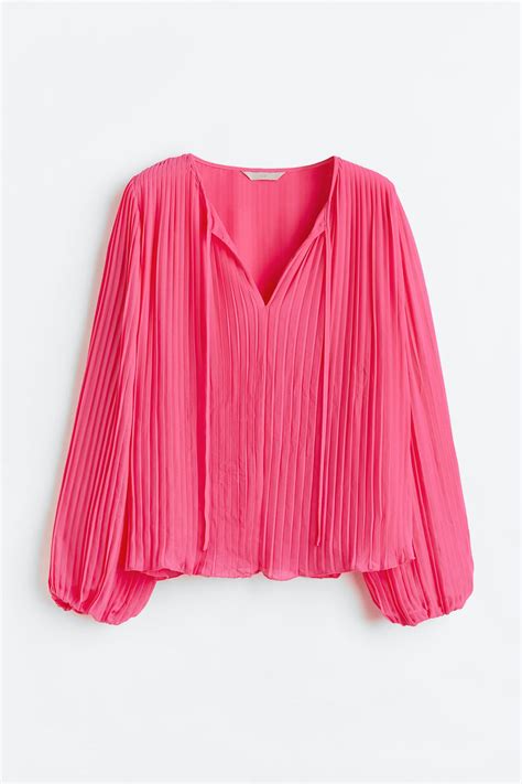 Blusa plisada rosa Continuara.org