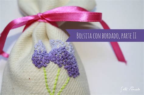 Bolsito verde bordado Continuara.org