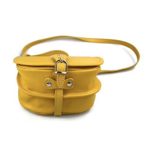 Bolso amarillo cuero Continuara.org