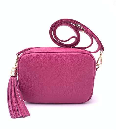 Bolso bandolera fucsia Continuara.org