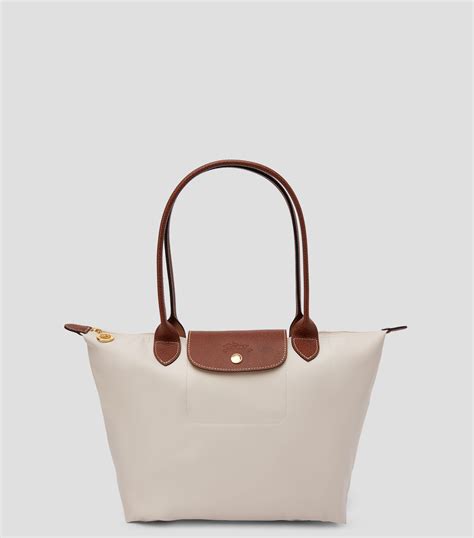 Bolso beige Continuara.org