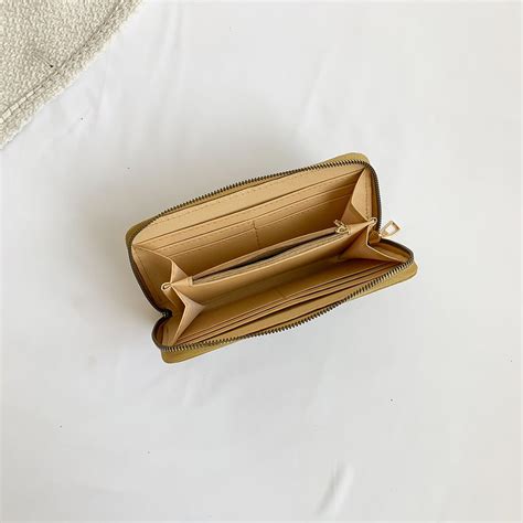 Bolso estrenar monedero Continuara.org
