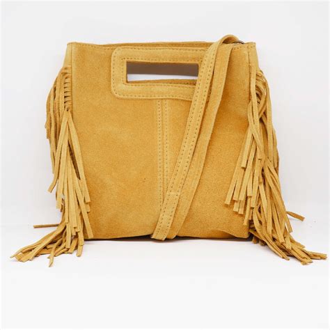 Bolso flecos Continuara.org