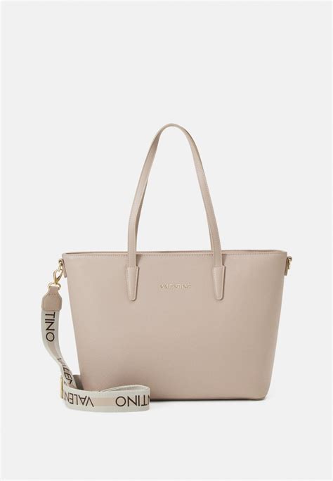 Bolso mano beige Continuara.org