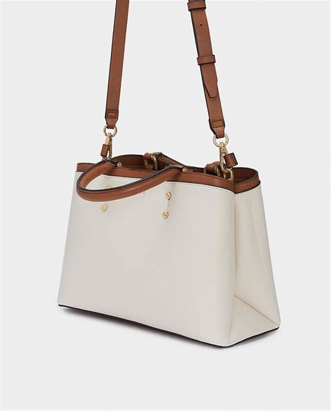 Bolso mano blanco Continuara.org