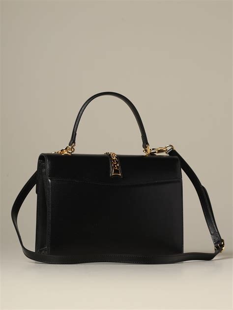 Bolso mano negro Continuara.org