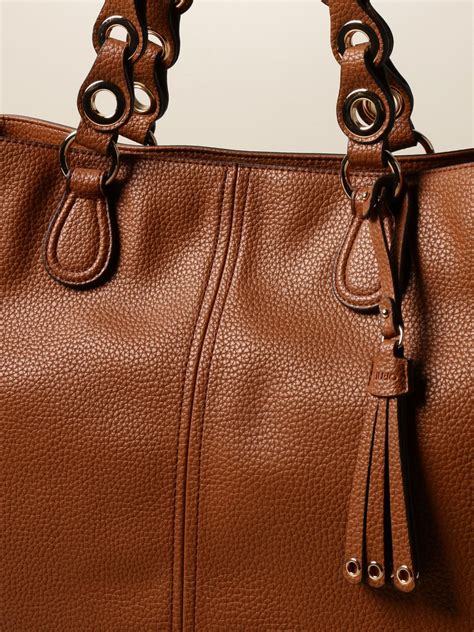 Bolso marron nuevo Continuara.org