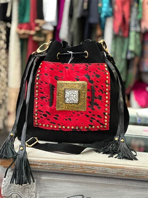 Bolso negro rojo Continuara.org