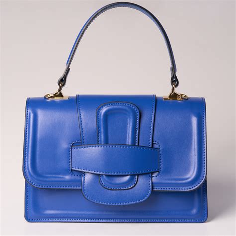 Bolso piel azul Continuara.org