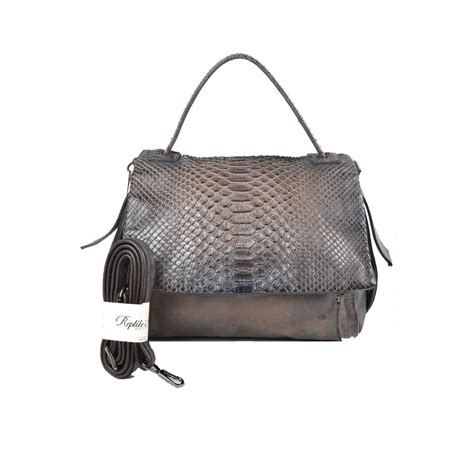 Bolso piel reptil Continuara.org