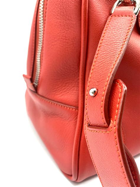 Bolso rojo cuero Continuara.org