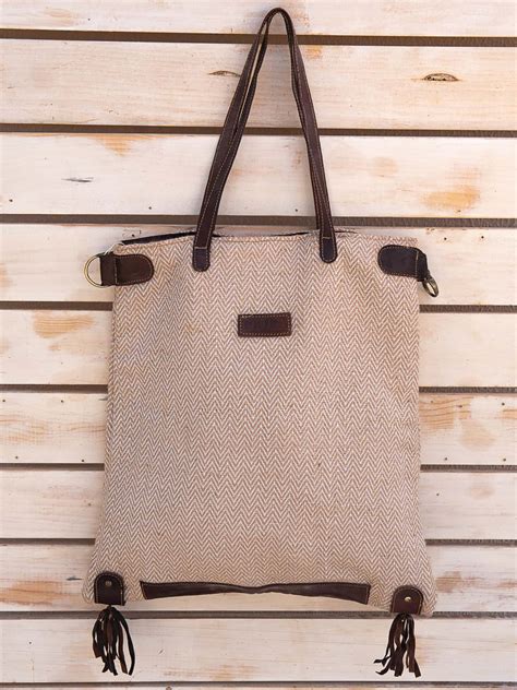 Bolso tela piel Continuara.org