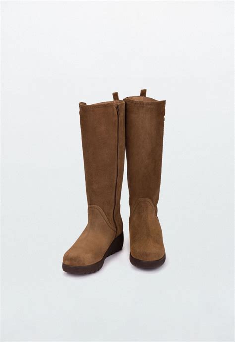 Bota cuna marron Continuara.org