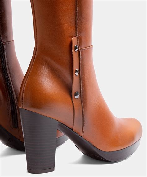 Botas altas cuero Continuara.org