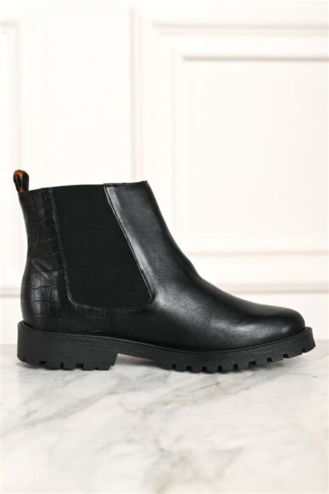 Botas cuero negro Continuara.org