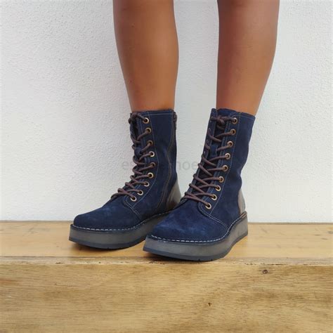 Botas fly by Continuara.org