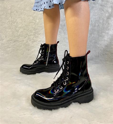 Botas negras charol Continuara.org