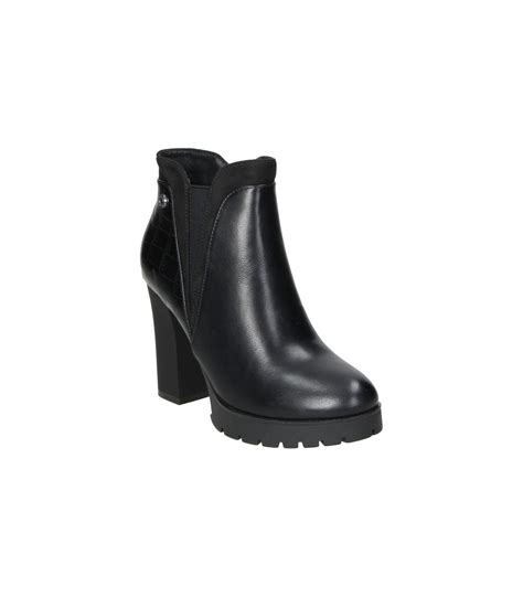 Botas senora marca Continuara.org