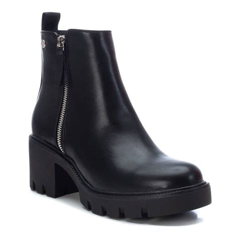 Botines negros xti Continuara.org