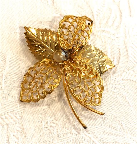 Broche vintage flor Continuara.org