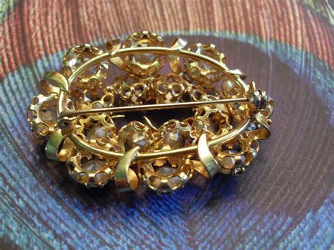 Broche vintage metal Continuara.org