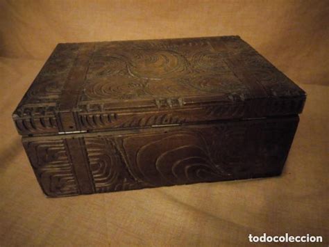 Caja antigua tallada Continuara.org
