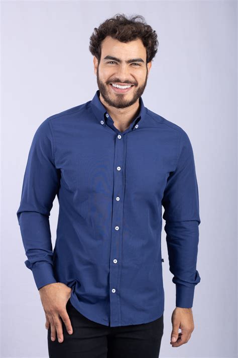 Camisa azul manga Continuara.org