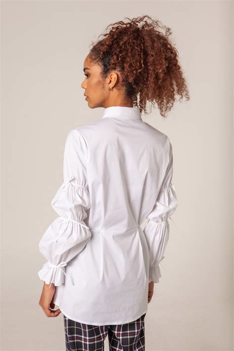 Camisa blanca lazos Continuara.org