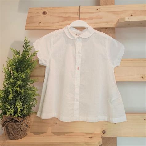 Camisa blanca nina Continuara.org