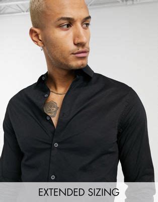 Camisa negra entallada Continuara.org
