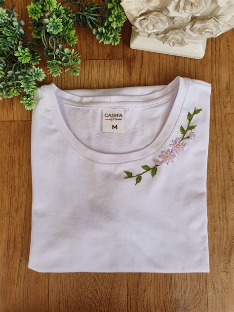 Camiseta flores t Continuara.org