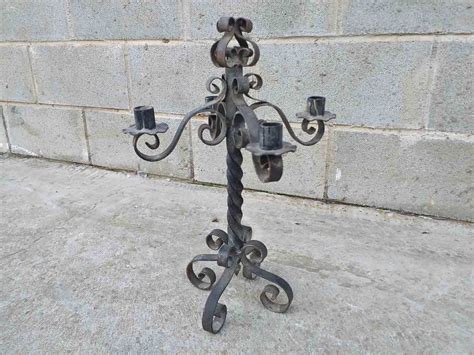 Candelabro antiguo hierro Continuara.org