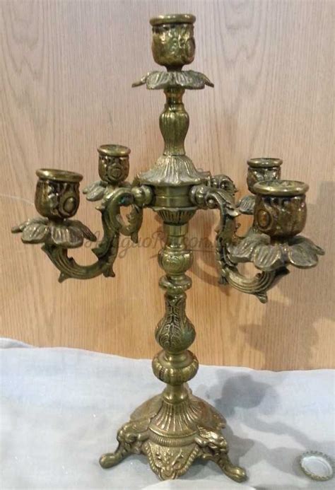 Candelabro bronce antiguo Continuara.org
