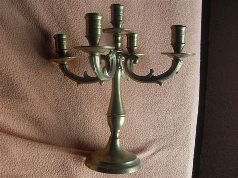 Candelabro bronce cinco Continuara.org