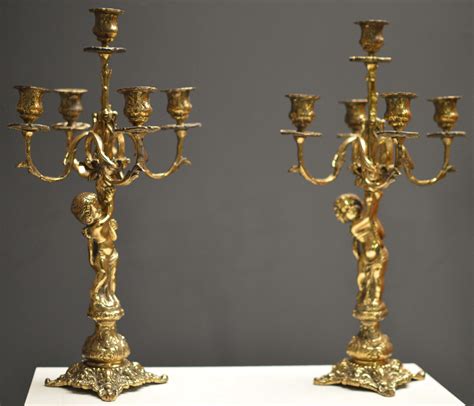 Candelabros bronce Continuara.org