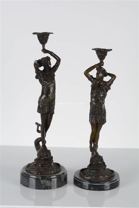 Candelabros hombre mujer Continuara.org