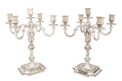 Candelabros plata marmol Continuara.org