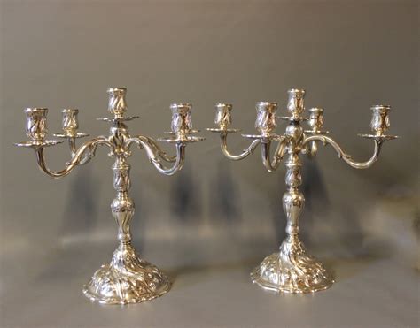 Candelabros plata Continuara.org