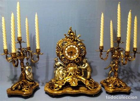 Candelabros reloj bronce Continuara.org