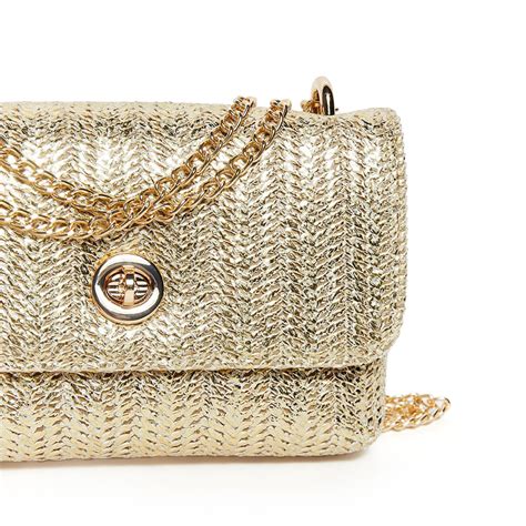 Cartera color dorado Continuara.org