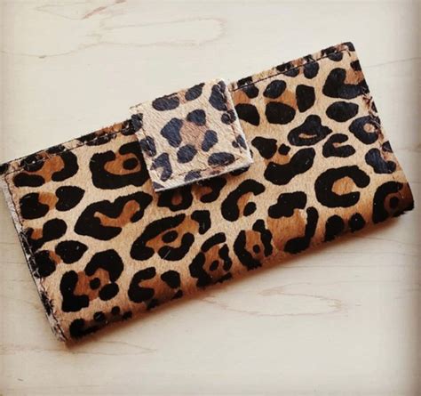 Cartera leopardo Continuara.org