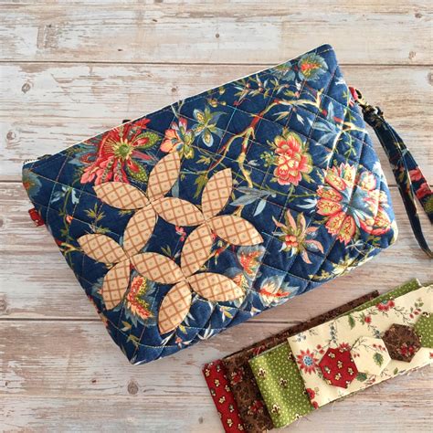 Cartera mano patchwork Continuara.org