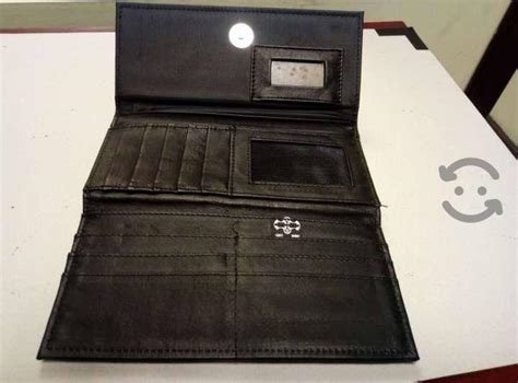 Cartera negra nueva Continuara.org